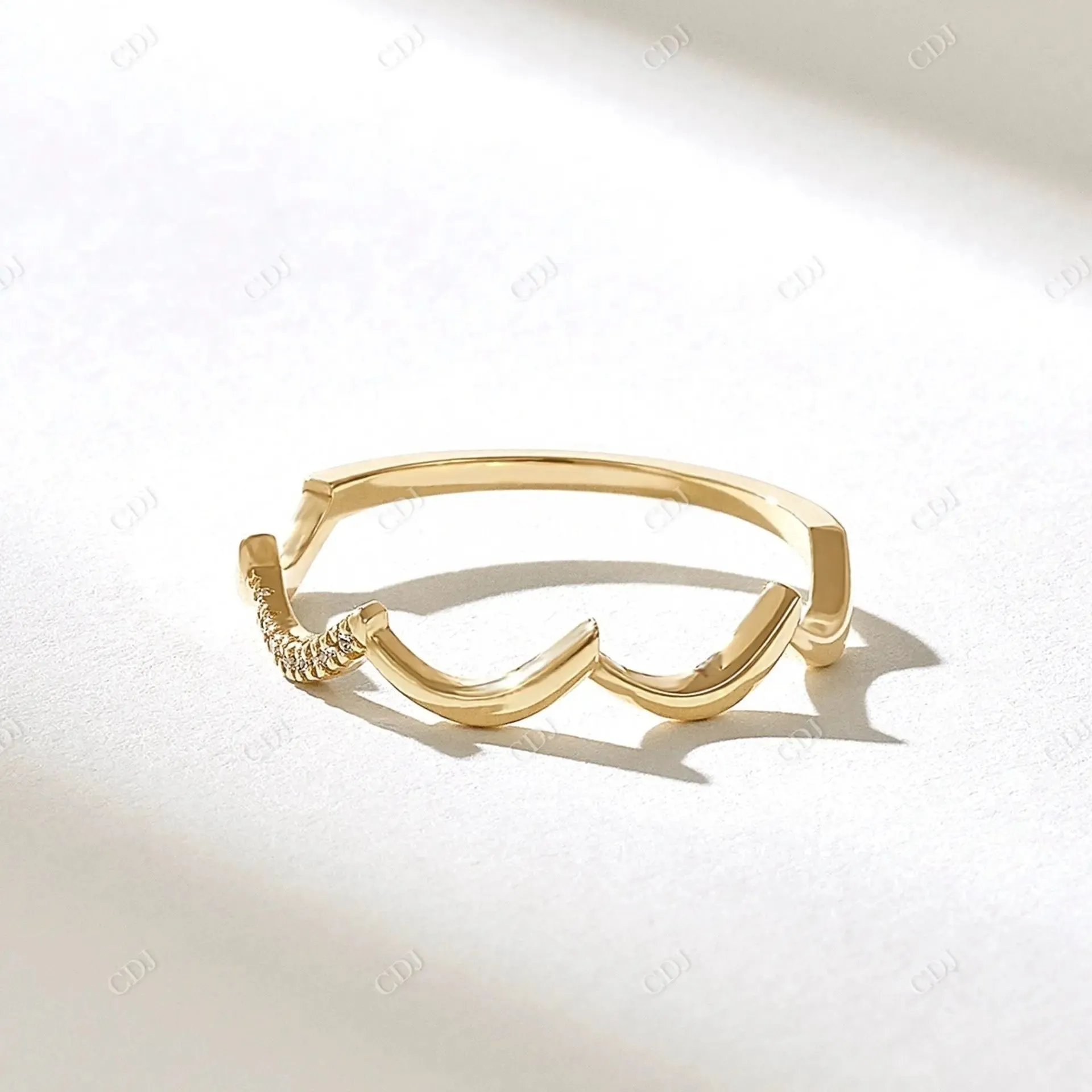 0.07CTW Round Cut CVD Ups And Down Curved Wedding Band